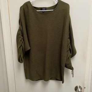 Green sweater with puff sleeves